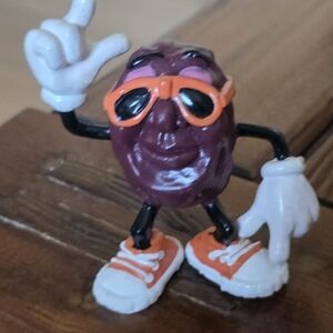Purple Raisin Figurine with Orange Sunglasses and Shoes